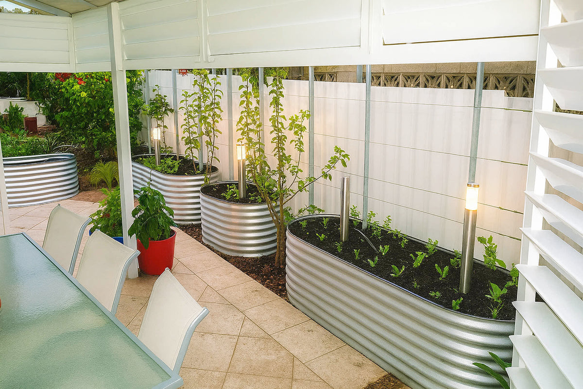 Steel garden beds in a paved courtyard